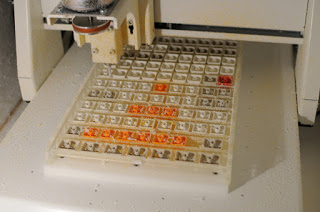 Small keycaps being machine milled